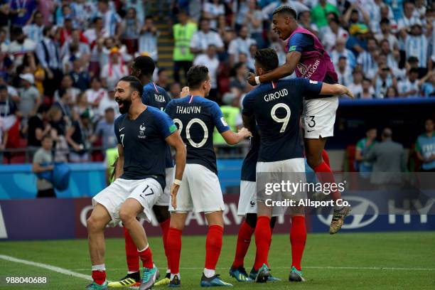 Adil Rami of France and teamamtes celebrate their 4-3 win over Argentina at the end of the match during the 2018 FIFA World Cup Russia Round of 16...