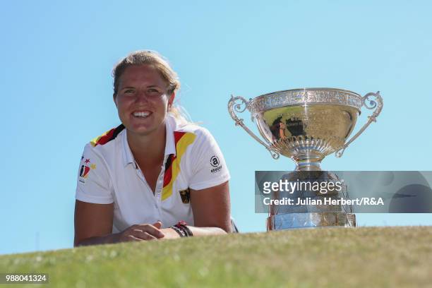 Leonie Harm of Germany with the trophy after winning the final on day five of The Ladies' British Open Amateur Championship at Hillside Golf Club on...