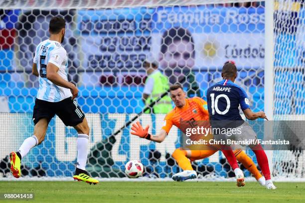 Kylian Mbappe of France scores his side's fourth goal during the 2018 FIFA World Cup Russia Round of 16 match between France and Argentina at Kazan...