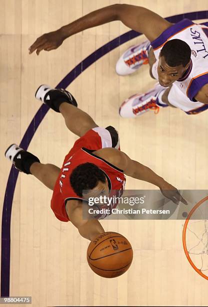 Andre Miller of the Portland Trail Blazers lays up a shot against the Phoenix Suns during Game One of the Western Conference Quarterfinals of the...