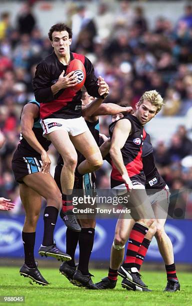 Adam Ramanauskas for Essendon marks in the match between the Essendon Bombers and Port Power in round 17 of the AFL played at Football Park in...