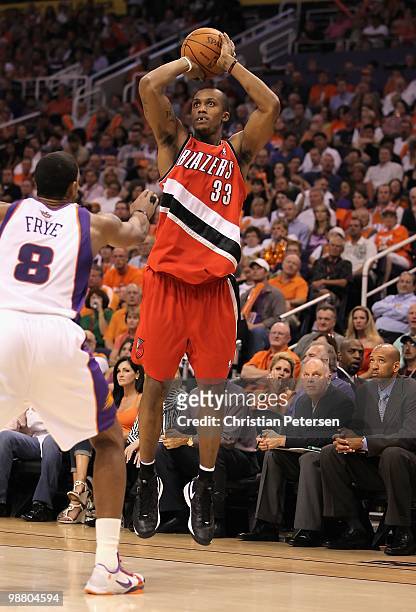 Dante Cunningham of the Portland Trail Blazers puts up a shot against the Phoenix Suns during Game Two of the Western Conference Quarterfinals of the...