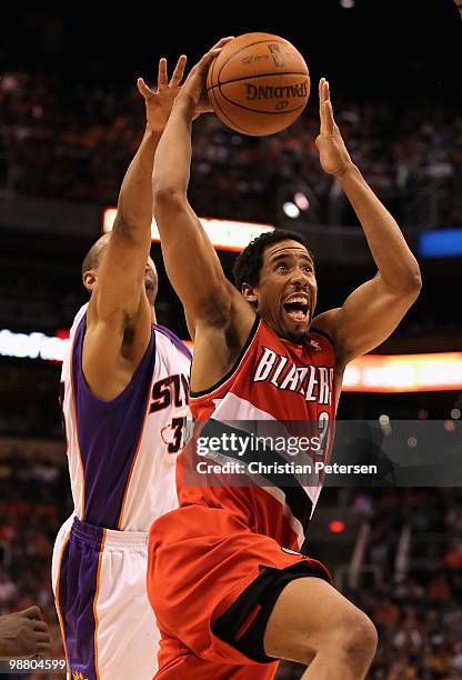 Andre Miller of the Portland Trail Blazers puts up a shot against the Phoenix Suns during Game Two of the Western Conference Quarterfinals of the...