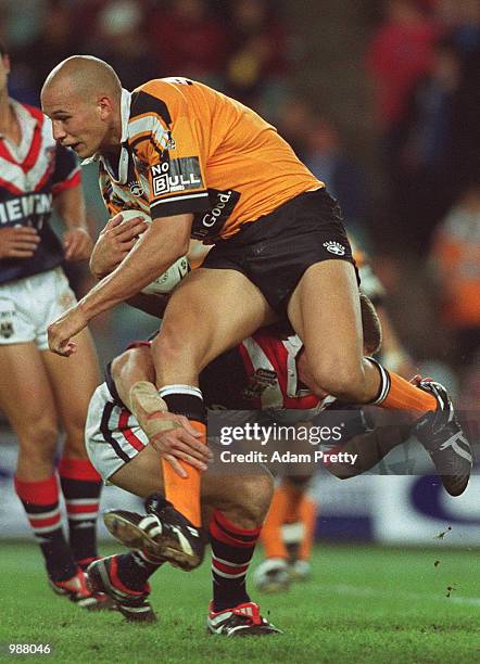 Tyran Smith of Wests Tigers in action against the Sydney Roosters during Round 14 of the National Rugby League played at the Sydney Football Stadium,...