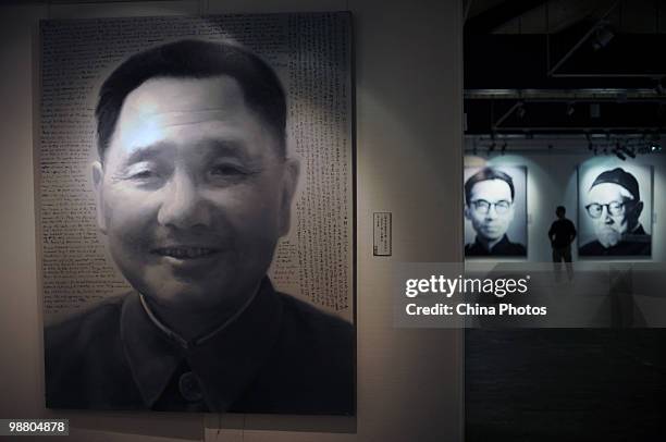 The portrait of former Chinese leader Deng Xiaoping is seen at the 'Figures ---- Xu Weixin Painting Art Exhibition' at the Wuhan Art Museum on May 2,...