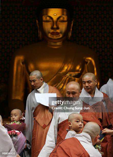 Children attend during the 'Children Becoming Buddhist Monks' ceremony forthcoming buddha's birthday at a Chogye temple on May 3, 2010 in Seoul,...