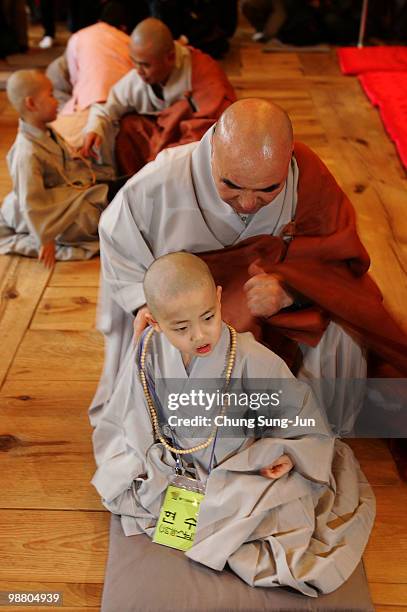 Children attend during the 'Children Becoming Buddhist Monks' ceremony forthcoming buddha's birthday at a Chogye temple on May 3, 2010 in Seoul,...