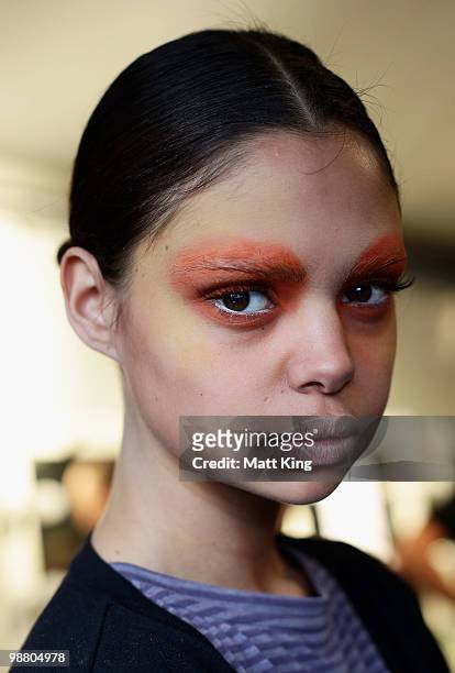 Model Samantha Harris prepares backstage ahead of the Camilla show on the first day of Rosemount Australian Fashion Week Spring/Summer 2010/11 at the...