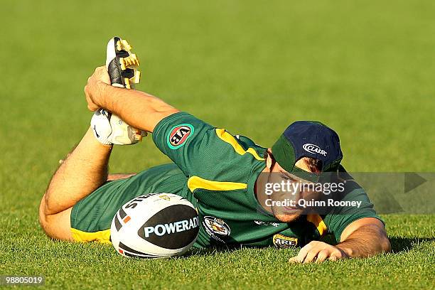 Cooper Cronk of the Kangaroos stretches during an Australian ARL Kangaroos training session at Visy Park on May 3, 2010 in Melbourne, Australia.