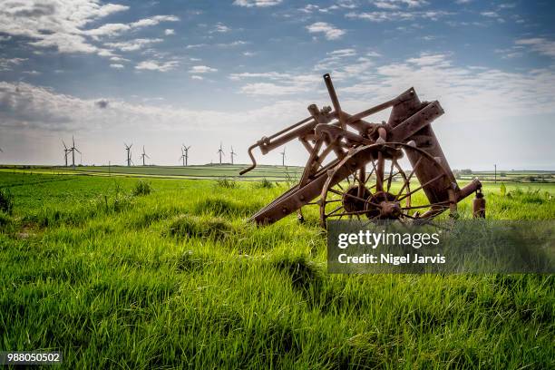 ploughs into shares or wind turbines - jarvis summers stock pictures, royalty-free photos & images