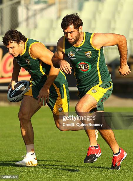 Billy Slater and Cameron Smith of the Kangaroos do sprints during an Australian ARL Kangaroos training session at Visy Park on May 3, 2010 in...