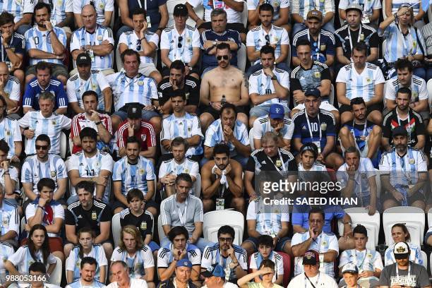 Argentina supporters react during the Russia 2018 World Cup round of 16 football match between France and Argentina at the Kazan Arena in Kazan on...