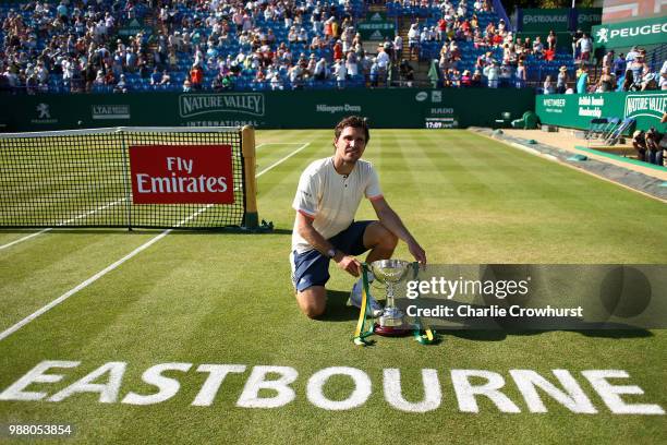 Mischa Zverev of Germany celebrates with the cup after winning his mens singles final against Lukas Lacko of Slovakia during Day Nine of the Nature...