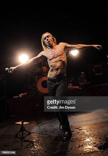Iggy Pop performs live on stage with The Stooges at Hammersmith Apollo on May 2, 2010 in London, England. Iggy Pop and the Stooges performed the...