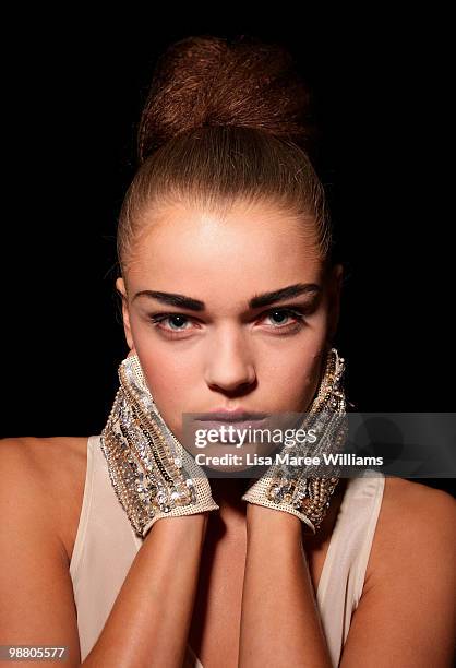 Model prepares backstage ahead of the Rachel Gilbert show on the first day of Rosemount Australian Fashion Week Spring/Summer 2010/11 at the Overseas...