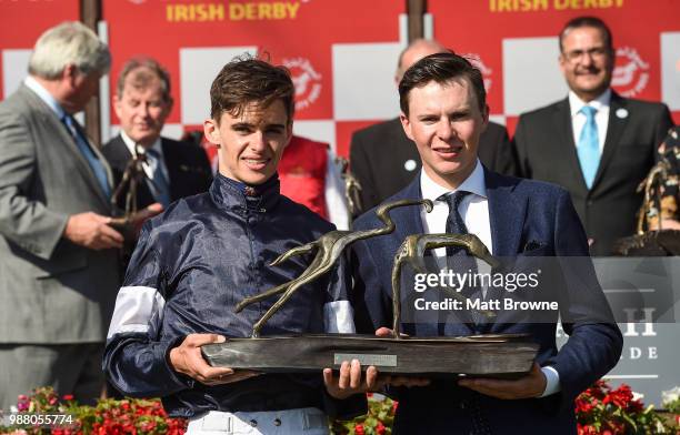 Kildare , Ireland - 30 June 2018; Jockey Donnacha O'Brien, left, and trainer Joseph O'Brien with the trophy after winning the Dubai Duty Free Irish...