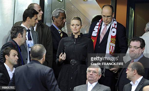 Prince Albert of Monaco and girlfriend Charlene Wittstock arrives in the VIP stand to attend the French Cup final football match Paris Saint-Germain...