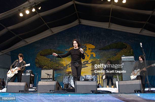Dean Fertita, Jack White, Alison Mosshart and Jack Lawrence of The Dead Weather performs during the 41st Annual New Orleans Jazz & Heritage Festival...