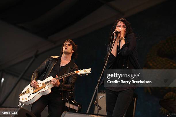 Musicians Dean Fertita and Alison Mosshart of Dead Weather perform during day 7 of the 41st annual New Orleans Jazz & Heritage Festival at the Fair...