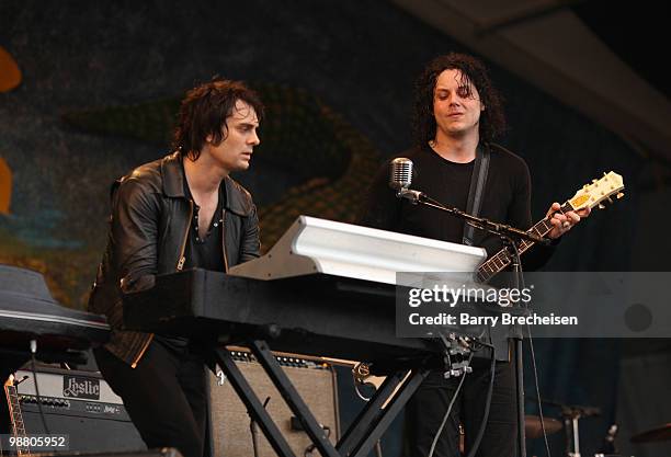 Musicians Dean Fertita and Jack White of Dead Weather perform during day 7 of the 41st annual New Orleans Jazz & Heritage Festival at the Fair...