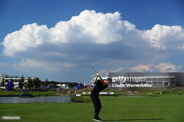 Marcus Kinhult of Sweden plays his second shot into the 18th green during the third round of the HNA Open de France at Le Golf National on June 30,...