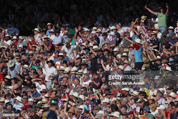 Kent supporters in the Mound Stand cheer a six during the Royal London One-Day Cup Final match between Kent and Hampshire on June 30, 2018 in London,...