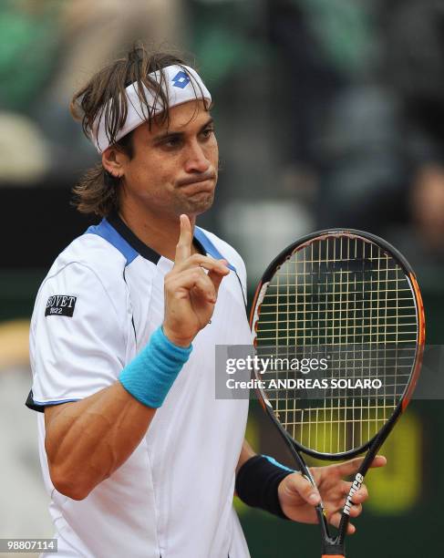 Spanish David Ferrer reacts after loosing a point against Spanish Rafael Nadal during their ATP Tennis Open final match in Rome on May 2, 2010. AFP...