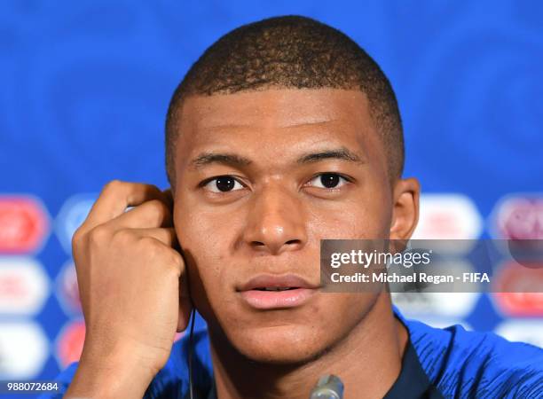 Kylian Mbappe of France speaks during a press conference after the 2018 FIFA World Cup Russia Round of 16 match between France and Argentina at Kazan...