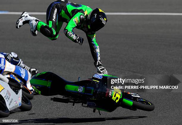 Fontana Racing team's Italian Ricardo Moretti falls during the 125cc race of the Spanish Grand Prix at the Jerez racetrack on May 2, 2010 in Jerez de...