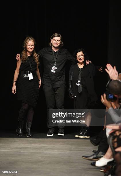 Designers Dayne Johnston and Elisabeth Findlay of Zambesi acknowledge the crowd on the catwalk on the first day of Rosemount Australian Fashion Week...