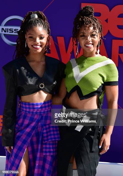 Halle Bailey and Chloe Bailey of Chloe X Halle arrive to the 2018 BET Awards held at Microsoft Theater on June 24, 2018 in Los Angeles, California.