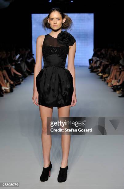 Model showcases designs by Aurelio Costarella on the catwalk on the first day of Rosemount Australian Fashion Week Spring/Summer 2010/11 at the...