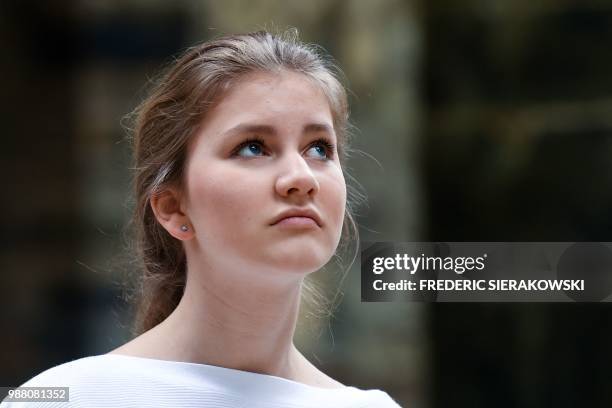 Belgium's Crown Princess Elisabeth poses during a photo session of the Belgian Royal Family's vacation at the Villers Abbey in Villers-la-Ville, on...