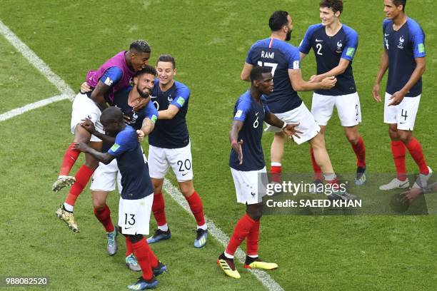 France's players celebrate after winning the Russia 2018 World Cup round of 16 football match between France and Argentina at the Kazan Arena in...