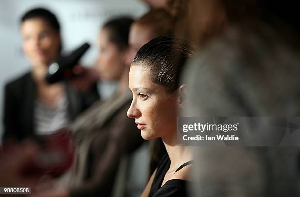 Model prepares backstage ahead of the Christopher Esber show on the first day of Rosemount Australian Fashion Week Spring/Summer 2010/11 at the...