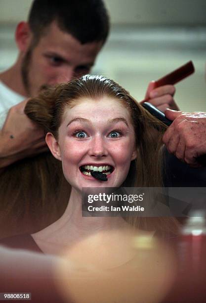 Model prepares backstage ahead of the Christopher Esber show on the first day of Rosemount Australian Fashion Week Spring/Summer 2010/11 at the...