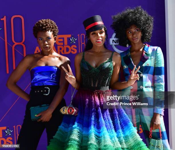 Alex Belle, Janelle Monae and Isis Valentino arrive to the 2018 BET Awards held at Microsoft Theater on June 24, 2018 in Los Angeles, California.