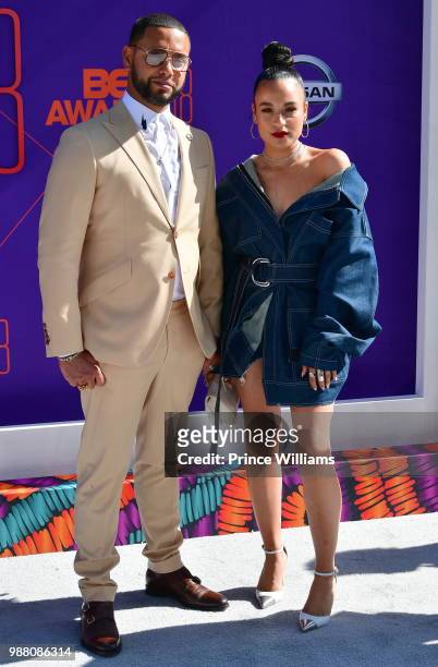 Director X and Karena Evans arrive to the 2018 BET Awards held at Microsoft Theater on June 24, 2018 in Los Angeles, California.