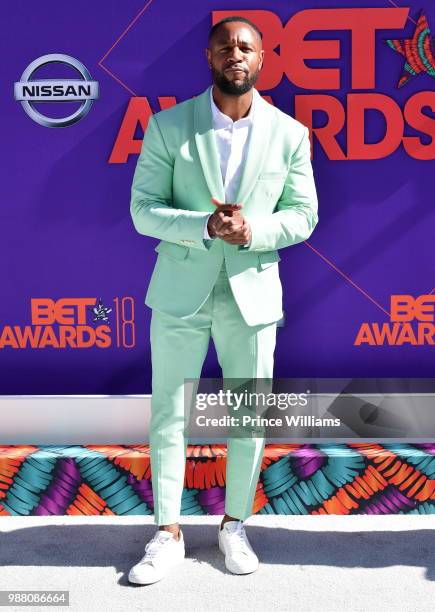 Singer Tank arrives to the 2018 BET Awards held at Microsoft Theater on June 24, 2018 in Los Angeles, California.