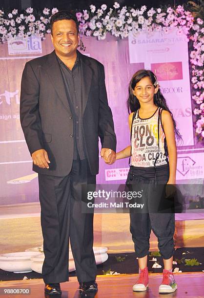 Sanjay Gupta walks the ramp at Anu and Shashi Ranjan�s annual fashion show to create awareness against female foeticide in Mumbai on May 2, 2010.