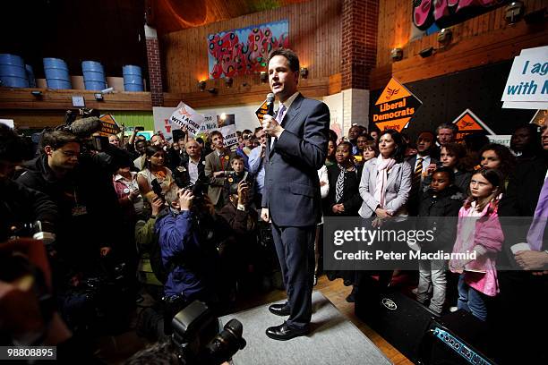 Liberal Democrat leader Nick Clegg speaks at the Palace Project community Centre in Streatham watched by his wife Miriam Gonzalez Durantez on May 3,...