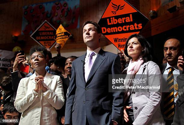 Liberal Democrat leader Nick Clegg stands with his wife Miriam Gonzalez Durantez and television presenter Floella Benjamin at the Palace Project...