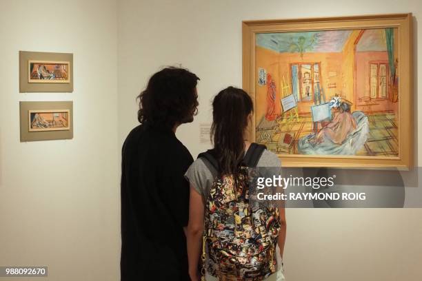 Visitors visit the Raoul Dufy exhibition "les ateliers de Perpignan 1940-1950" at the museum at the Hyacinthe Rigaud museum in Perpignan, southern...