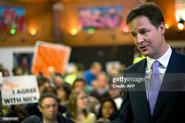 Liberal Democrat leader Nick Clegg speaks to the media during a visit to the Palace Project community centre in Streatham, South London on May 3,...