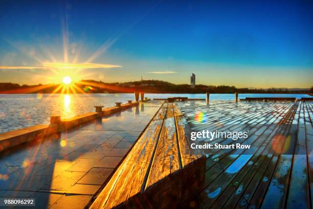 sunrise over lake burley griffin - lake burley griffin stock pictures, royalty-free photos & images