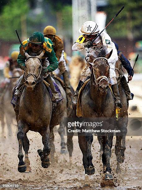 Calvin Borel atop Super Saver crosses the finish line to win the 136th running of the Kentucky Derby on May 1, 2010 in Louisville, Kentucky.