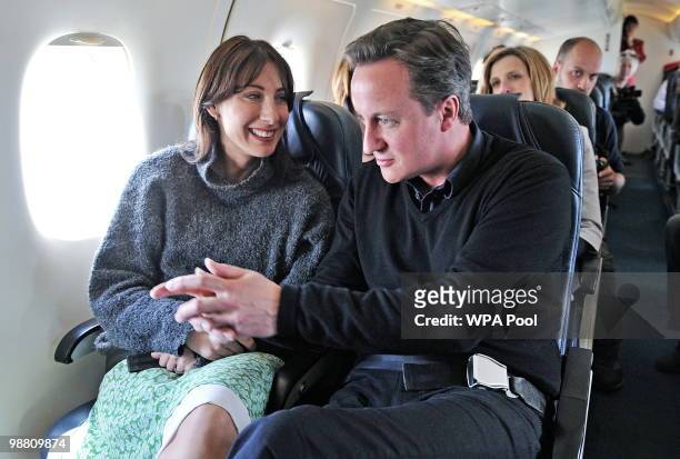 Samantha Cameron and Conservative Party Leader David Cameron are pictured on a private plane as they fly from Blackpool to London on May 3, 2010 on...