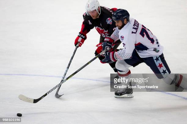 Player Nick Lazorko battles for the puck at the 2018 Ice Hockey Classic between USA and Canada at Qudos Bank Arena on June 30, 2018 in Sydney, NSW.