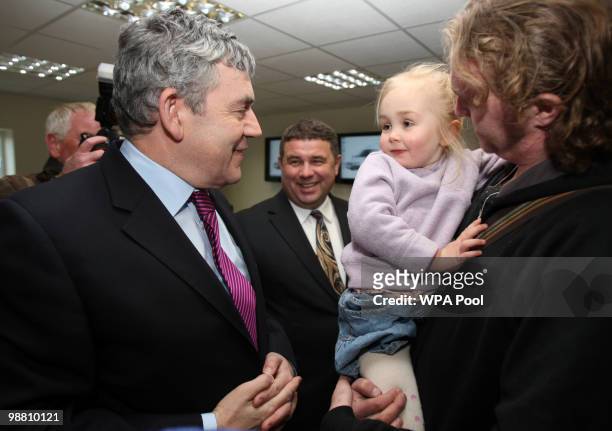 British Prime Minister Gordon Brown, meets with Eva Mansfield, aged 3, and her father Paul Mansfield at Abby Couriers on May 3, 2010 in Basildon,...