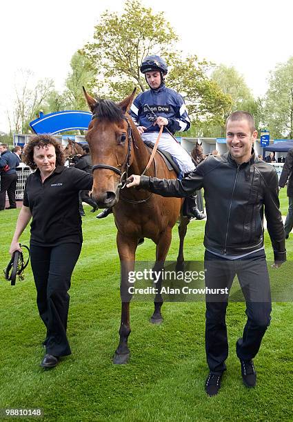 Chelsea and England footballer Joe Cole leads his horse Poppanan into the winners enclosure after it won The Betfair Racing Excellence Apprentice...